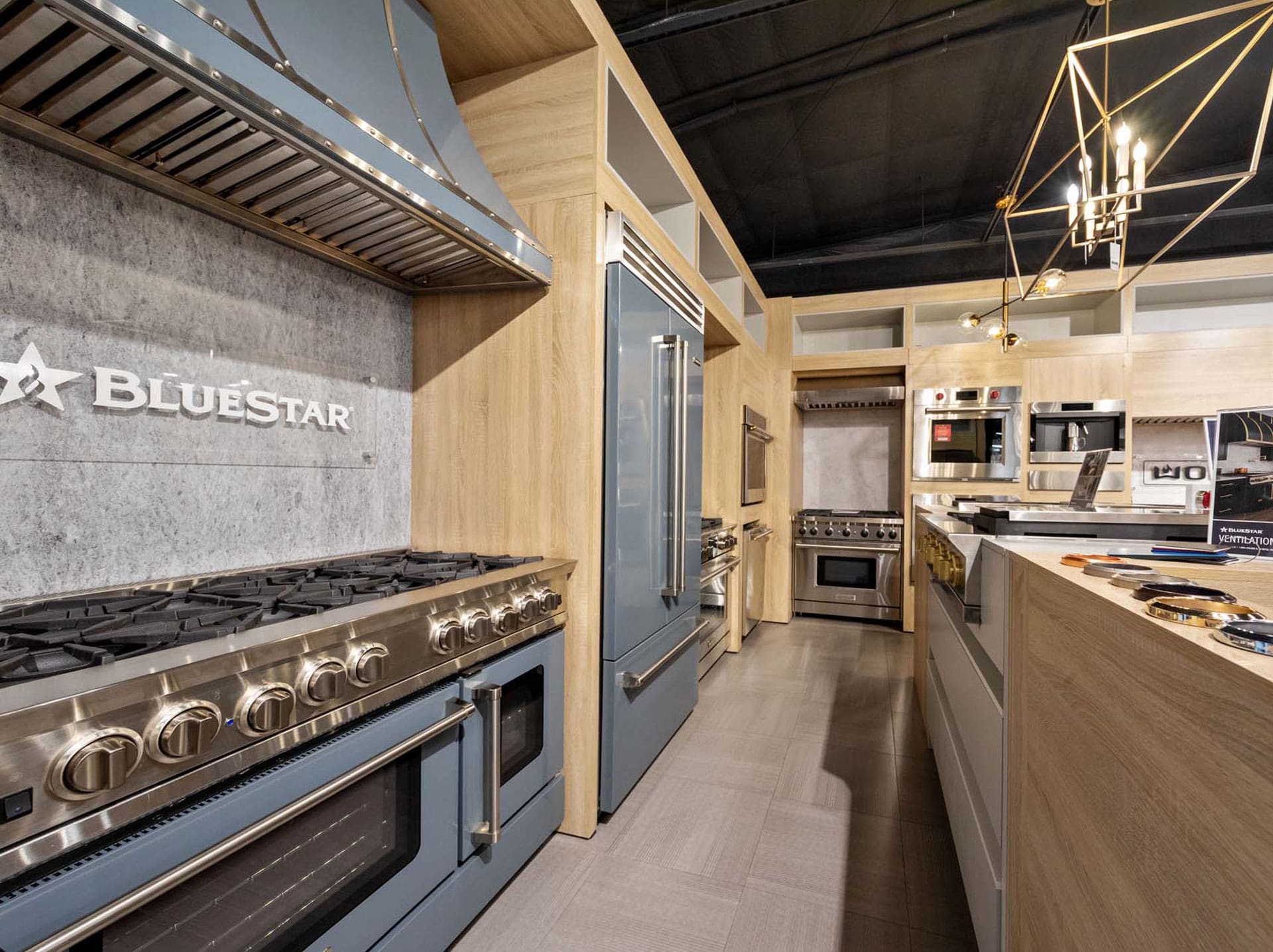 Closeup of kitchen fauctes at Facets of Lafayette Kitchen & Bath Showroom